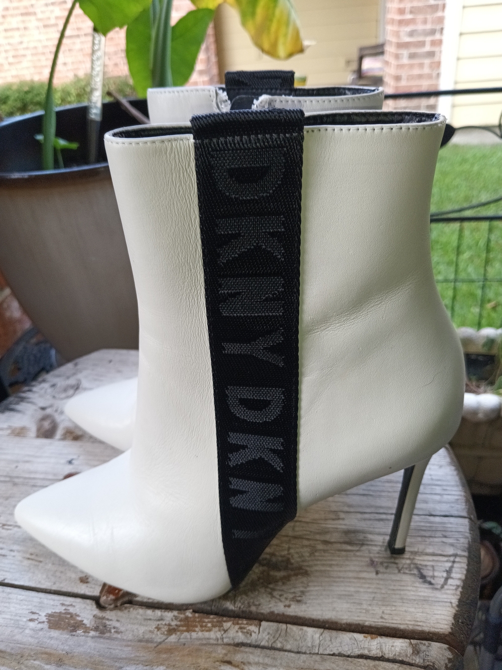 DKNY White Pointed-Toe Ankle Booties with Black Logo Pull Tab